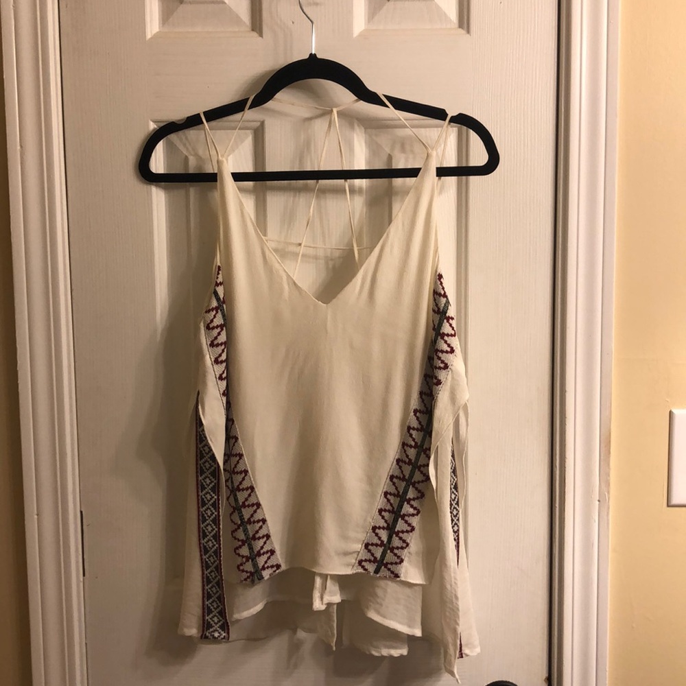 White tank with embroidered details